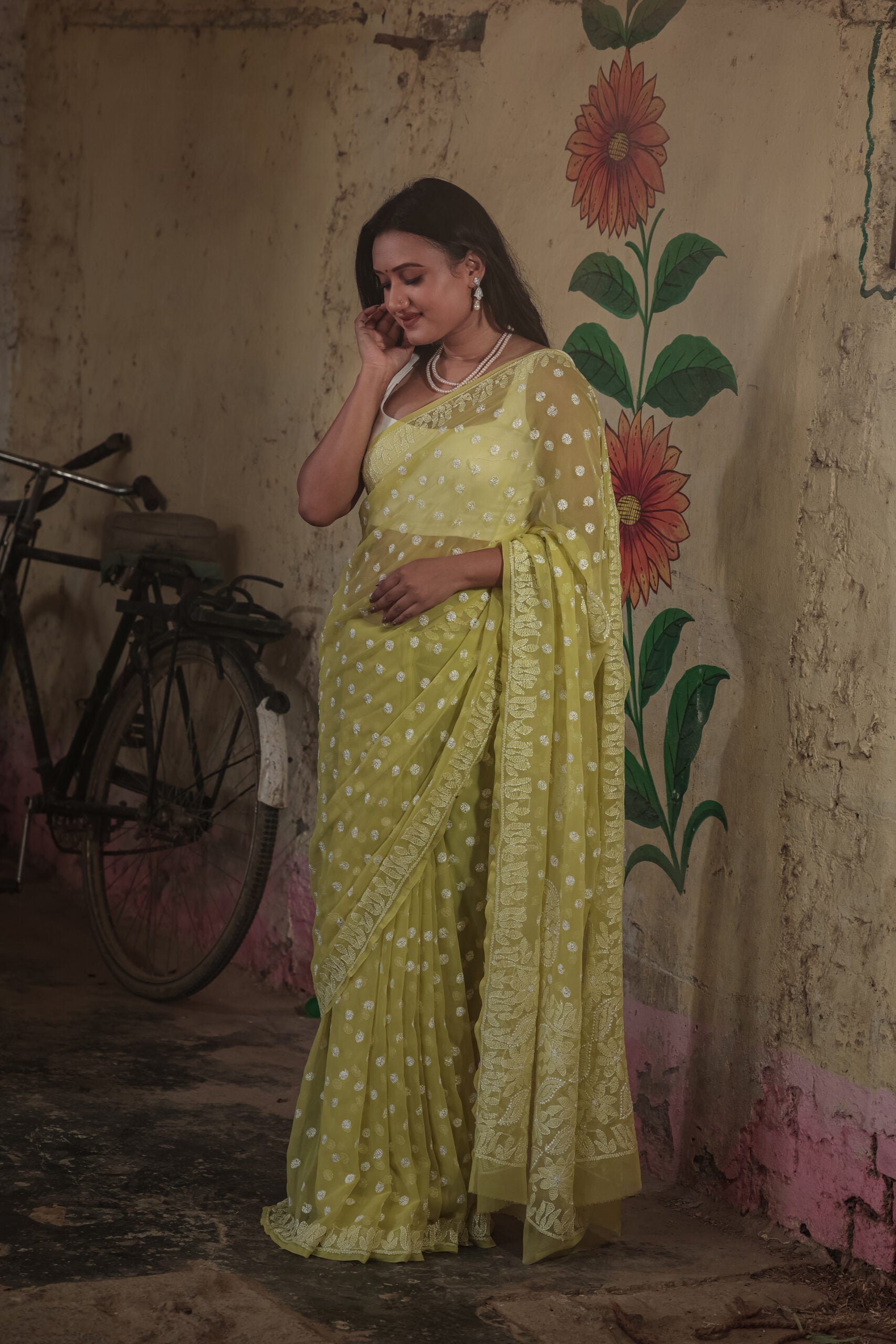 Urviya Chikankari Viscose Georgette Saree with Keel Jaal Work Yellow
