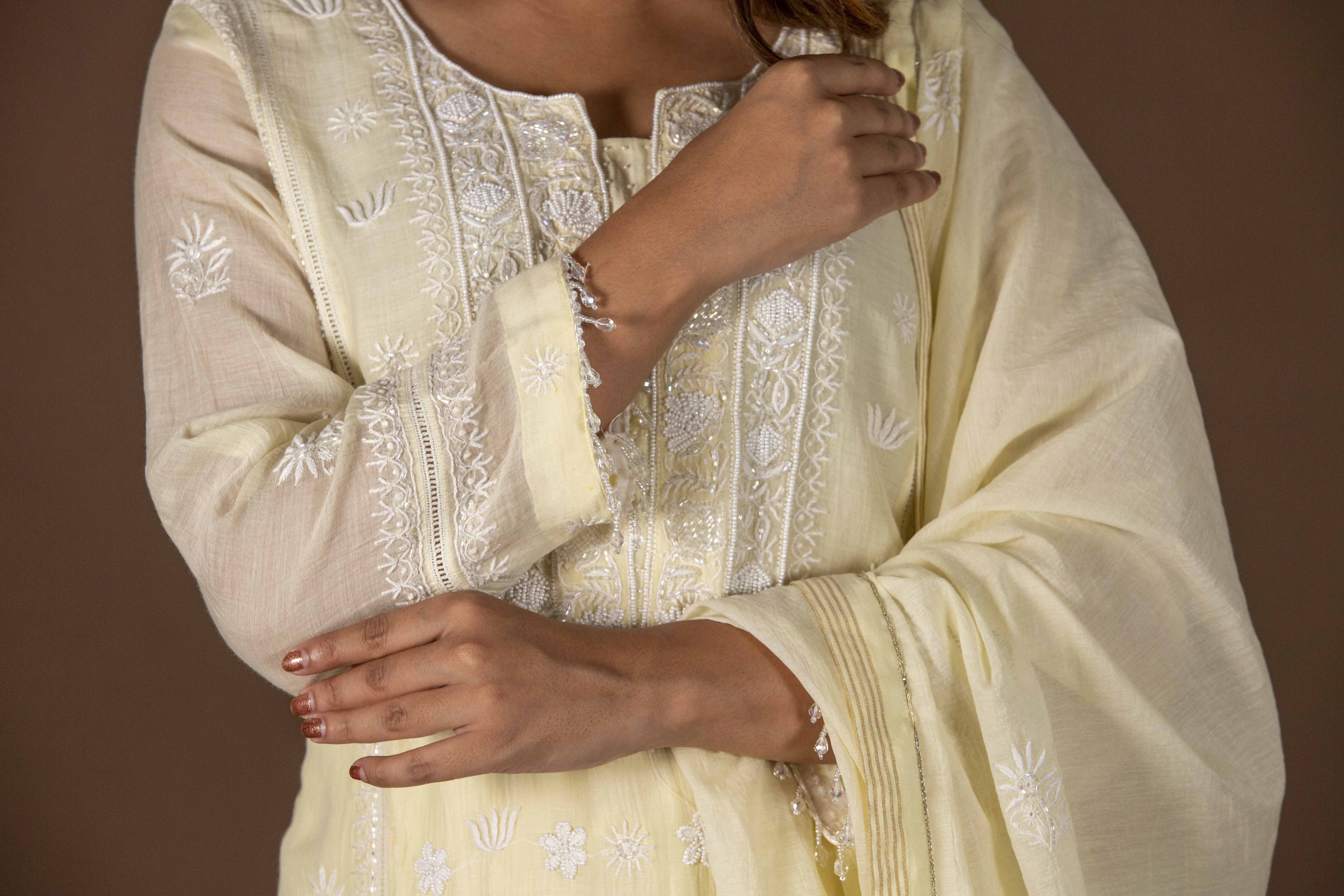 Urviya Chikankari Mul Chanderi Lemon Yellow Pearl and Cutdaana Work Panel Suit